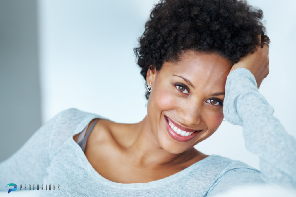 Hormone Balance and Mental Wellness – Profusions Smiling woman experiencing emotional clarity after hormone balance treatment